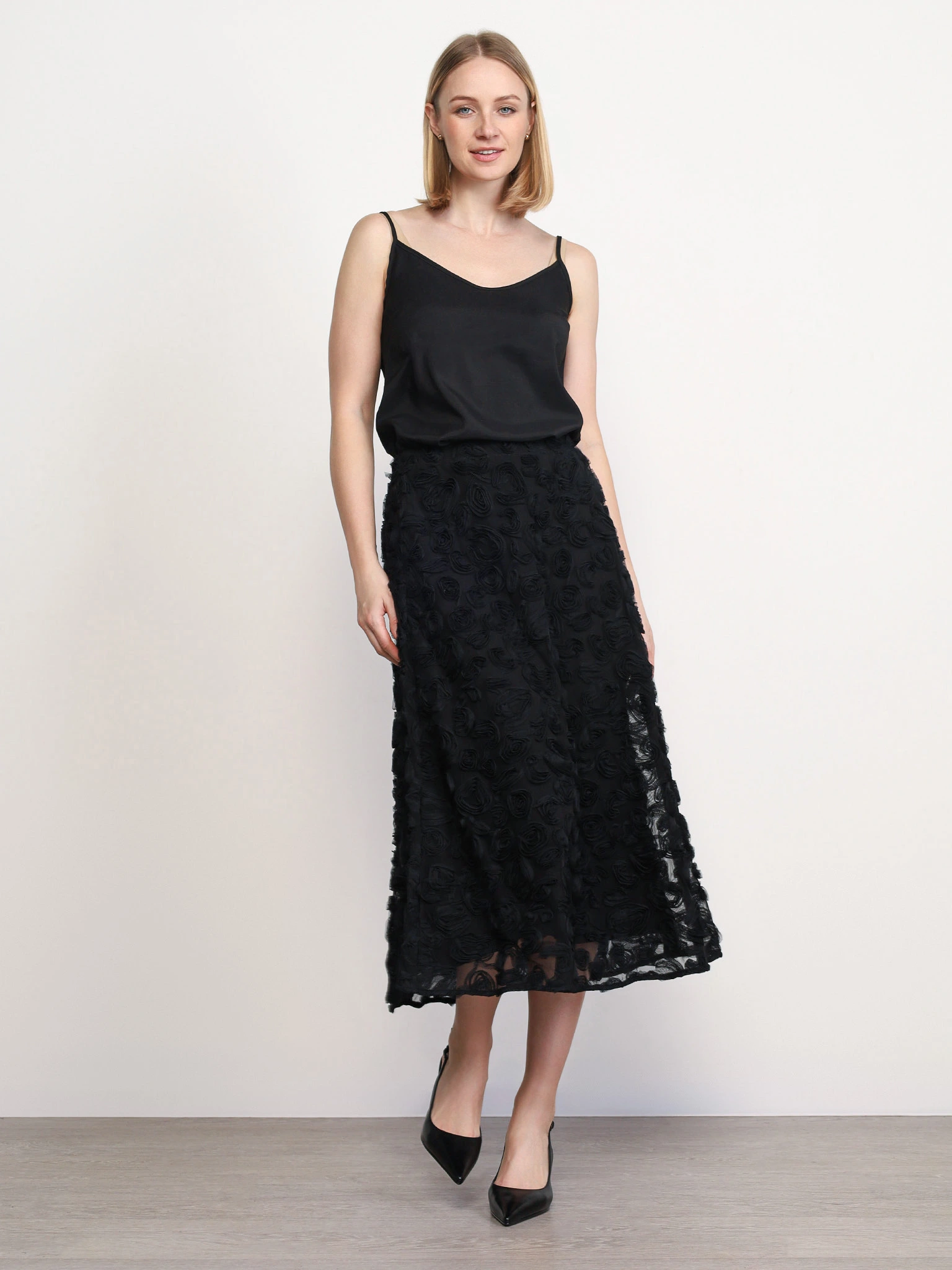 Юбка черного цвета из фактурного трикотажа